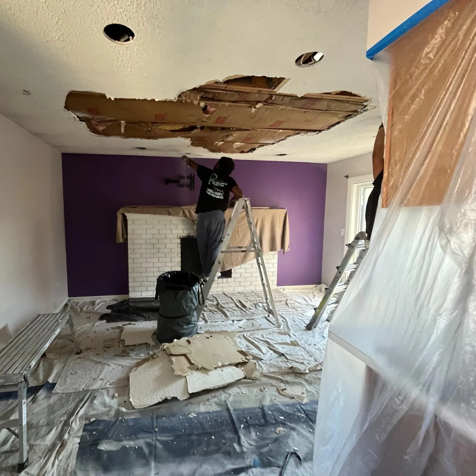 Ceiling drywall patched and taped, in progress before finishing