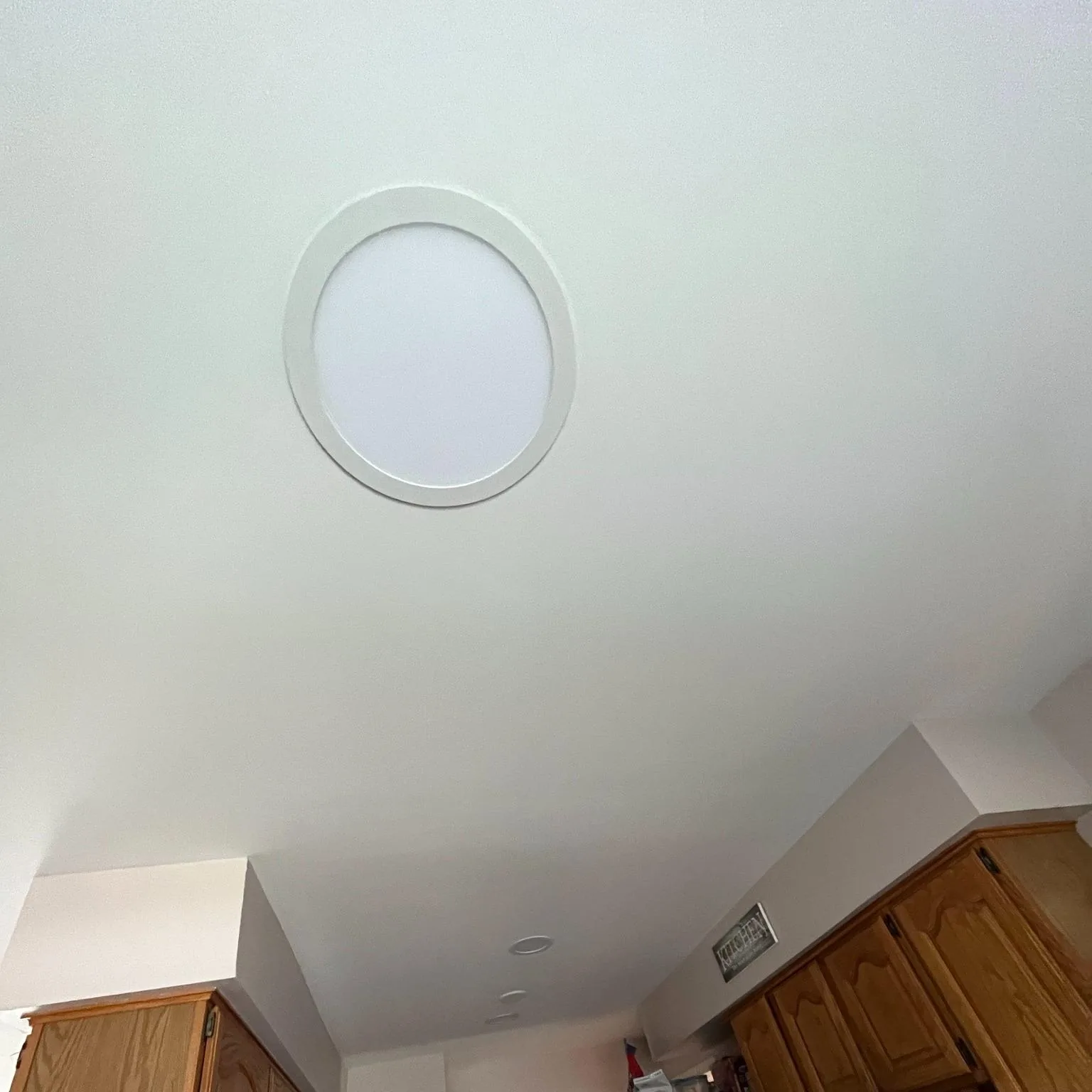 Smooth, finished ceiling after drywall repair and paint
